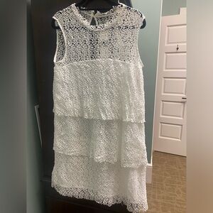 Size L. NWT. White dress never worn. Lace